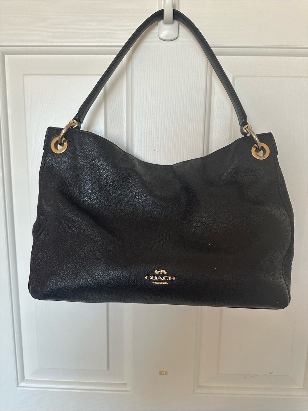 Classic Black coach purse with gold accents